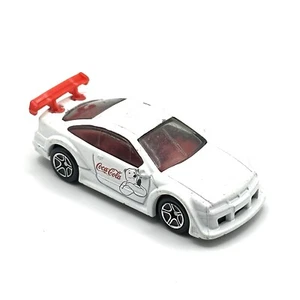 Matchbox Coca-Cola White Opel Calibra Touring Car with Red Wing & Polar Bear - Picture 1 of 4