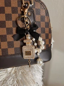 Dije de cadena caída perlas flores lazo de lujo para bolsos  - Imagen 1 de 2