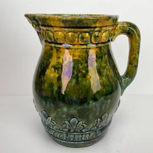 1904 McCoy Carnelian Glaze Majolica Pottery Pitcher Fleur De Lis *flaw* Antique - Picture 1 of 12