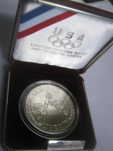 1988 D US Olympic Commemorative Silver One Dollar Coin, OGP Uncirculated - Picture 1 of 4