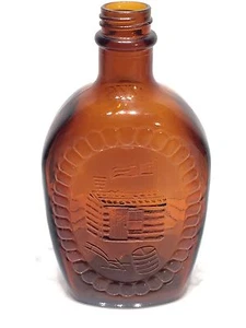 Botella de vidrio marrón ámbar vintage 1976 jarabe de cabaña de troncos bicentenario, 24 oz. - Imagen 1 de 5