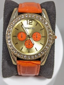 Manhattan by Croton Goldtone Dial Crystal Accent Round Case Orange Leather Watch - Picture 1 of 10
