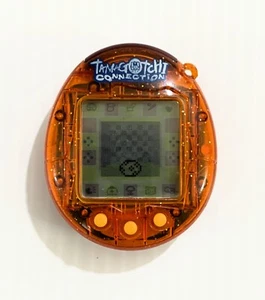 2004 TAMAGOTCHI CONNECTION v1 " Orange Glitter " CLEAR TRANSPARENT - Picture 1 of 12