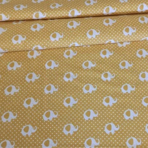 ELEPHANTS DOTS SMALL WHITE ON OCHRE YELLOW 100% COTTON FABRIC per metre - Imagen 1 de 1