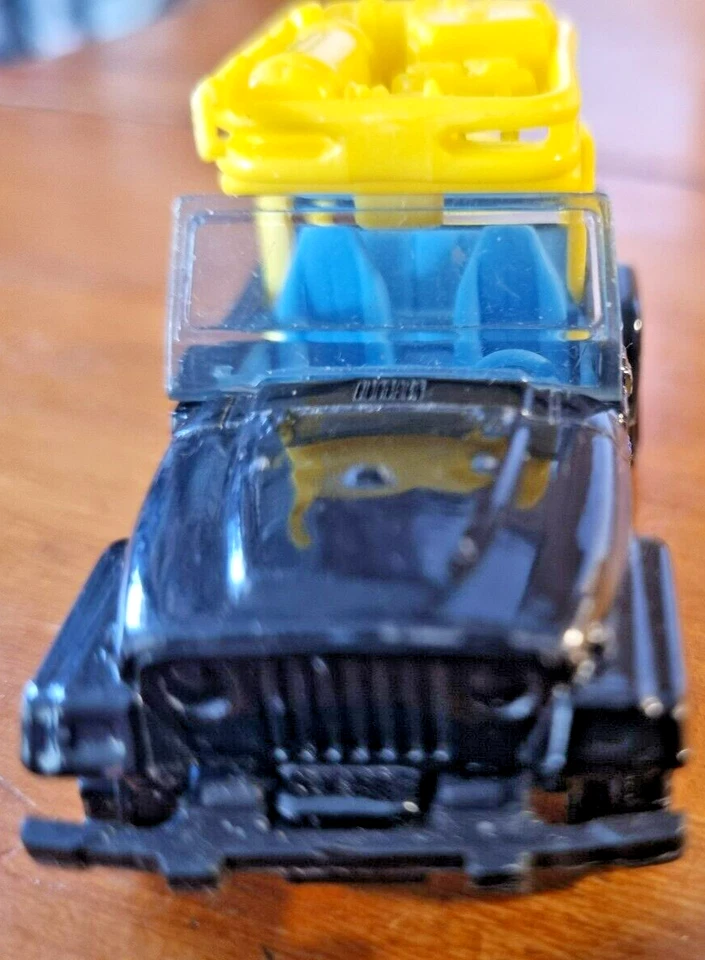 MATCHBOX '98 JEEP WRANGLER. Black and Yellow . Scale 1:64 . - Image 1 of 4