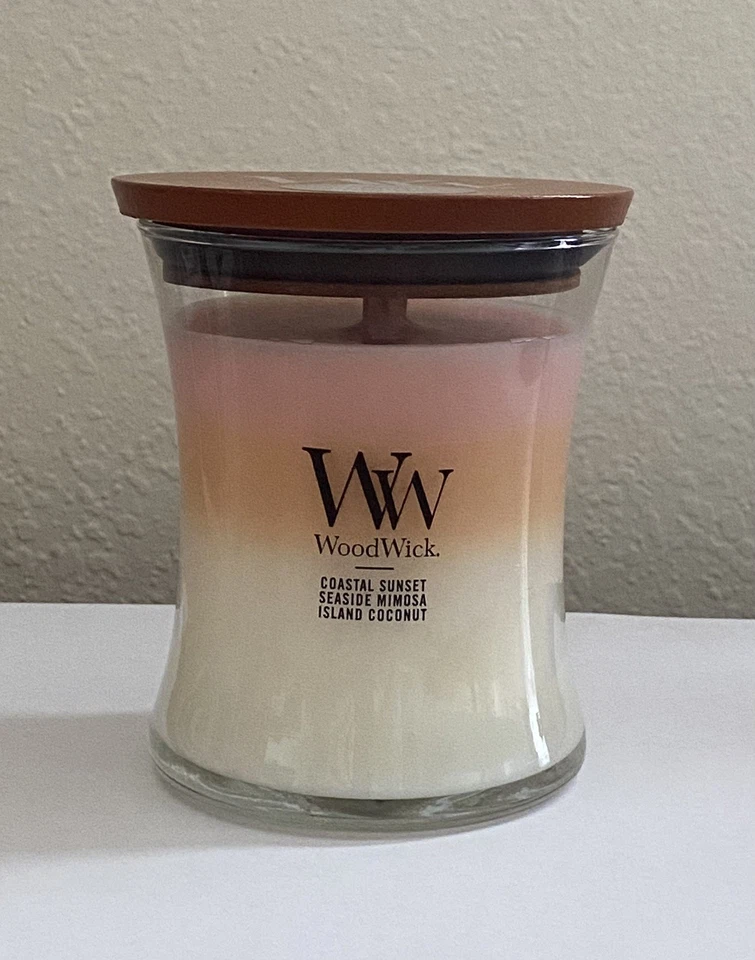 WoodWick 9.7 Oz Coastal Sunset, Seaside Mimosa, Island Coconut Trilogy Candle - Image 1 of 4