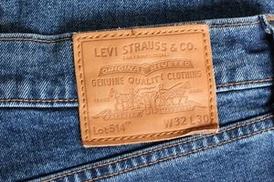 Jeans LEVI’S 514 PREMIUM Big E para hombre talla W32 L30 corte recto elástico... - Imagen 1 de 10