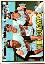 1967 Topps Baseball #1 The Champs Brooks Robinson - Frank Robinson - Hank Bauer