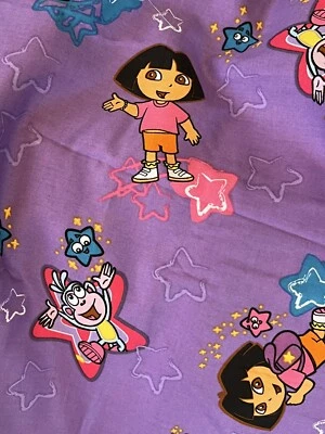 Tela Dora la Exploradora y Botas 4.5 Yardas Tela Algodón Púrpura Nick Jr. Foto 1 de 4