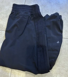 Ivivva Athletica Mädchen Your Pursuit Jogginghose Hose schwarz Seitenstreifen Größe 14 - Bild 1 von 7