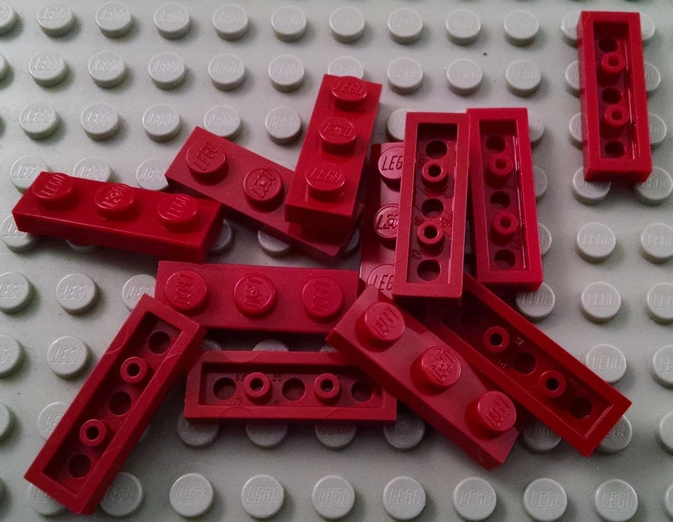 LEGO Lot of 12 Dark Red 1x3 Plate Pieces - Image 1 of 1