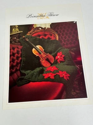 Páginas de libro con patrón de ganchillo de tiro de flor de pascua Foto 1 de 3