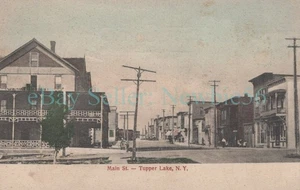 Tupper Lake NY - MAIN STREET STORE FRONTS - Hand Colored Postcard Adirondacks - Picture 1 of 2