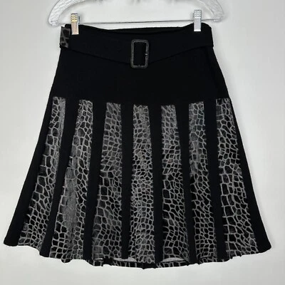 Falda con Paneles y Cinturón Estampado Animal - Talla Pequeña - Usada Foto 1 de 4