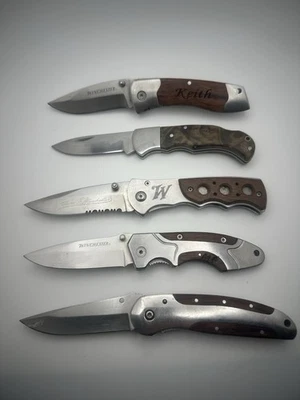 Lote de 5 cuchillos de bolsillo Winchester con mango de madera usados en buen estado Foto 1 de 4