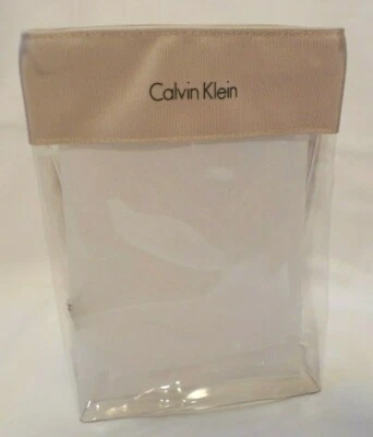 Bolsa de maquiagem cosmética Calvin Klein NOVA com zíper transparente bege claro acabamento CK - Imagem 1 de 4
