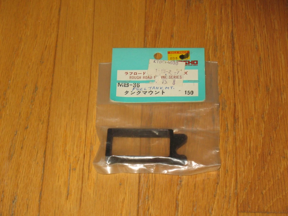 Kyosho MB-36 1/10 RC Fuel Tank Mount Rough Road Engine Series Vintage NEW NOS - Image 1 of 1