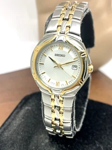Reloj para mujer Seiko SXD646 cuarzo esfera plateada fecha dos tonos acero inoxidable 26 mm - Imagen 1 de 13