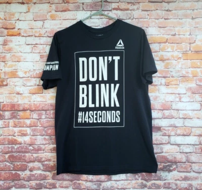 🔥 Ronda Rousey UFC Reebok Don't Blink 14 Seconds Shirt Men's Medium M Slim - Image 1 of 4