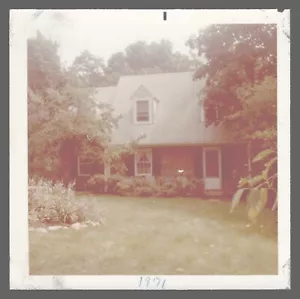 Found Photo 1971 Grey House With Circular Flower Bed 3.5 x 3.5 - Picture 1 of 2