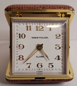 Reloj despertador de viaje Westclox cuerda imitación serpiente plegable compacto estuche rígido vintage - Imagen 1 de 4
