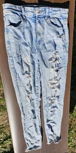 Jeans donna American Eagle Next Level elasticizzato strappato/invecchiato leggero taglia 4 - Foto 1 di 4