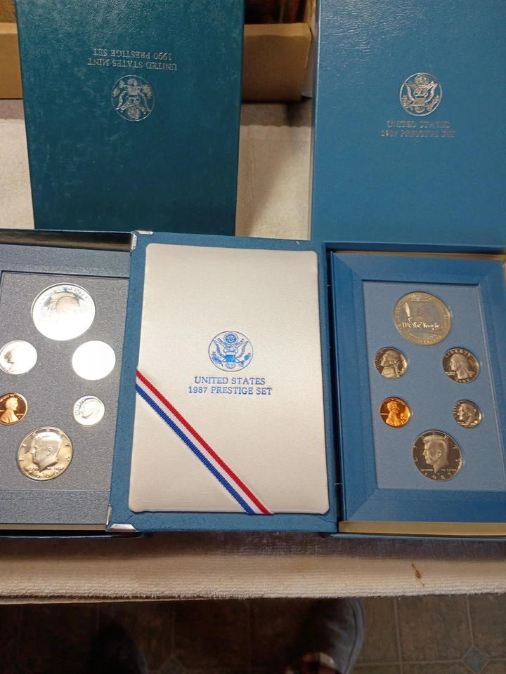1987 1990 2pc lot prestige set  silver dollar coin set - Image 1 of 3