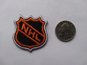 NHL LOGO SHIELD B/O SMALL JERSEY  JACKET VEST SHIRT HOODIE COLLAR HOCKEY PATCH - Picture 1 of 1