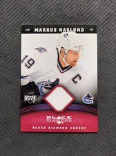 2006-07 UPPER DECK BLACK DIAMOND MARKUS NASLUND JERSEY RUBY RED J-MN #ed 51/100