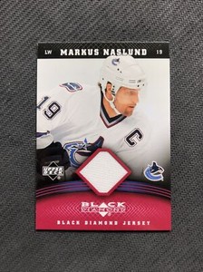 2006-07 UPPER DECK BLACK DIAMOND MARKUS NASLUND JERSEY RUBY RED J-MN #ed 51/100