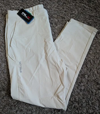 NUEVO CON ETIQUETAS RLX Ralph Lauren Pantalones de Golf Básicos Arena Absorbente Ojo de Pájaro Rendimiento Para Hombre 35 Foto 1 de 4