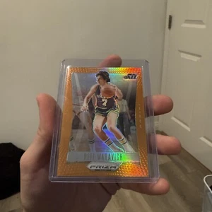 2023-2024 Panini Prizm Deca Pete Maravich Orange 11/49  - Picture 1 of 2