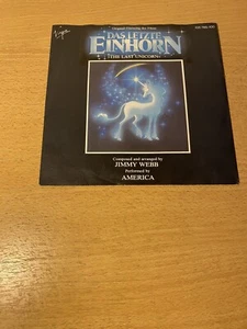 7" AMERICA * The Last Unicorn (MINT-) FILM OST "Das letzte Einhorn" - Bild 1 von 1