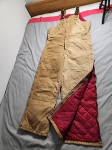 Vintage Carhartt gesteppte gefütterte Canvas Latzhose Herren Größe 36x30 braun R38 BRN - Bild 1 von 11