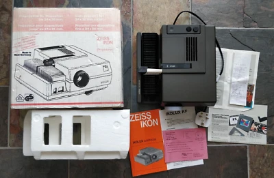 Proyector de diapositivas de enfoque automático Zeiss Ikon Ikolux 451 con caja original y manual ¡Como nuevo! Foto 1 de 4