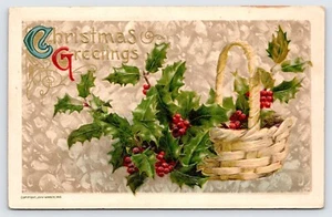 Cesta de postal antigua en relieve de saludos de Navidad de acebo, John Winsch c1910 - Imagen 1 de 2
