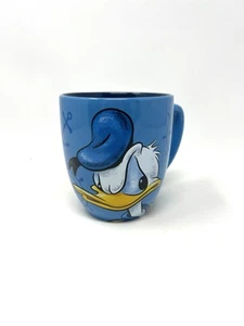 Tazza caffè Disney Parks Paperino ancora arrabbiata ritratto blu giallo 14 oz - Foto 1 di 8