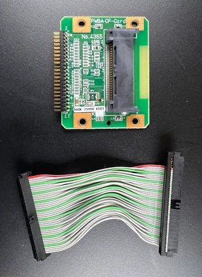 Genuine Oki Okidata B6300 PWBA CF-Card board No. 4355 with ribbon cable - Image 1 of 4