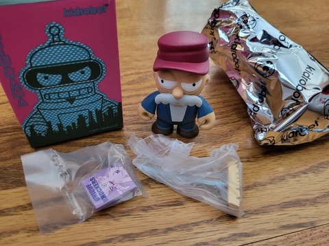 Kidrobot x Futurama Scruffy the Janitor Figure Good News Everyone Complete Cover