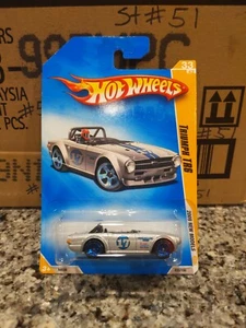2009 Hot Wheels #33 New Models 33/42 TRIUMPH TR6 Silver Variation w/Blue 5 Spoke - Picture 1 of 6