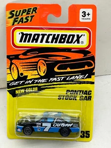 1993 MATCHBOX SUPERFAST MB 35 BLACK PONTIAC STOCK CAR 7 OUTLAW AUTO NEW ON CARD - Picture 1 of 3