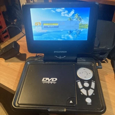Sylvania Portable DVD Player SDVD7027bl Black 7-Inch  Works Great! See Pictures - Image 1 of 4