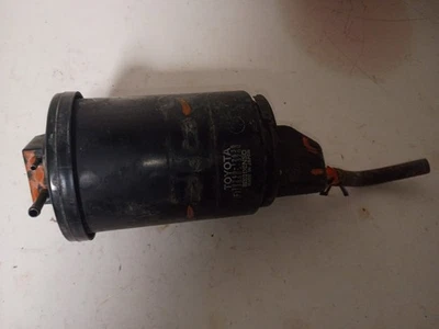 Bote de carbón de vapor Toyota Corolla 1993-1997 emisiones 77740-12630 usado OEM Foto 1 de 4