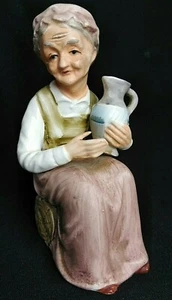 NORLEANS JAPAN Old Lady figurine sitting on log getting water in pitcher GRANDMA - Picture 1 of 12