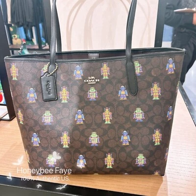Bolso de Mano Cosmic Coach City Nuevo con Etiquetas en Lona Signature con Estampado de Robot CW027 Foto 1 de 4