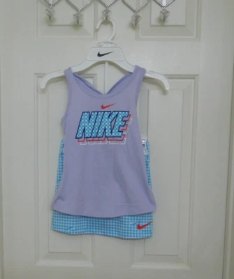 Nuevo con etiquetas Conjunto de 2 piezas Nike con logotipo de guinga y pantalón corto azul talla 6 Foto 1 de 2
