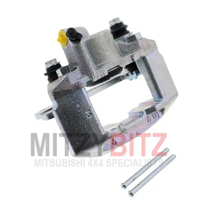 Pinza freno posteriore sinistra completa per Mitsubishi PAJERO SPORT KH4W 2.5D - Foto 1 di 6