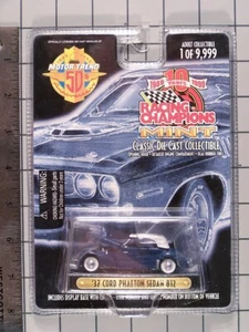 Racing Champions Mint 1999, 1937 Cord Phaeton Sedan 812, deep blue w/white top - Picture 1 of 1