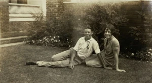 Young Man & Woman Sitting On Grass B&W Photograph 2.75 x 4.5 - Picture 1 of 3