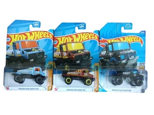 Hot Wheels  Set of 3 MERCEDES-BENZ UNIMOG 1300  Brown, Light Blue and Black, New - Picture 1 of 4